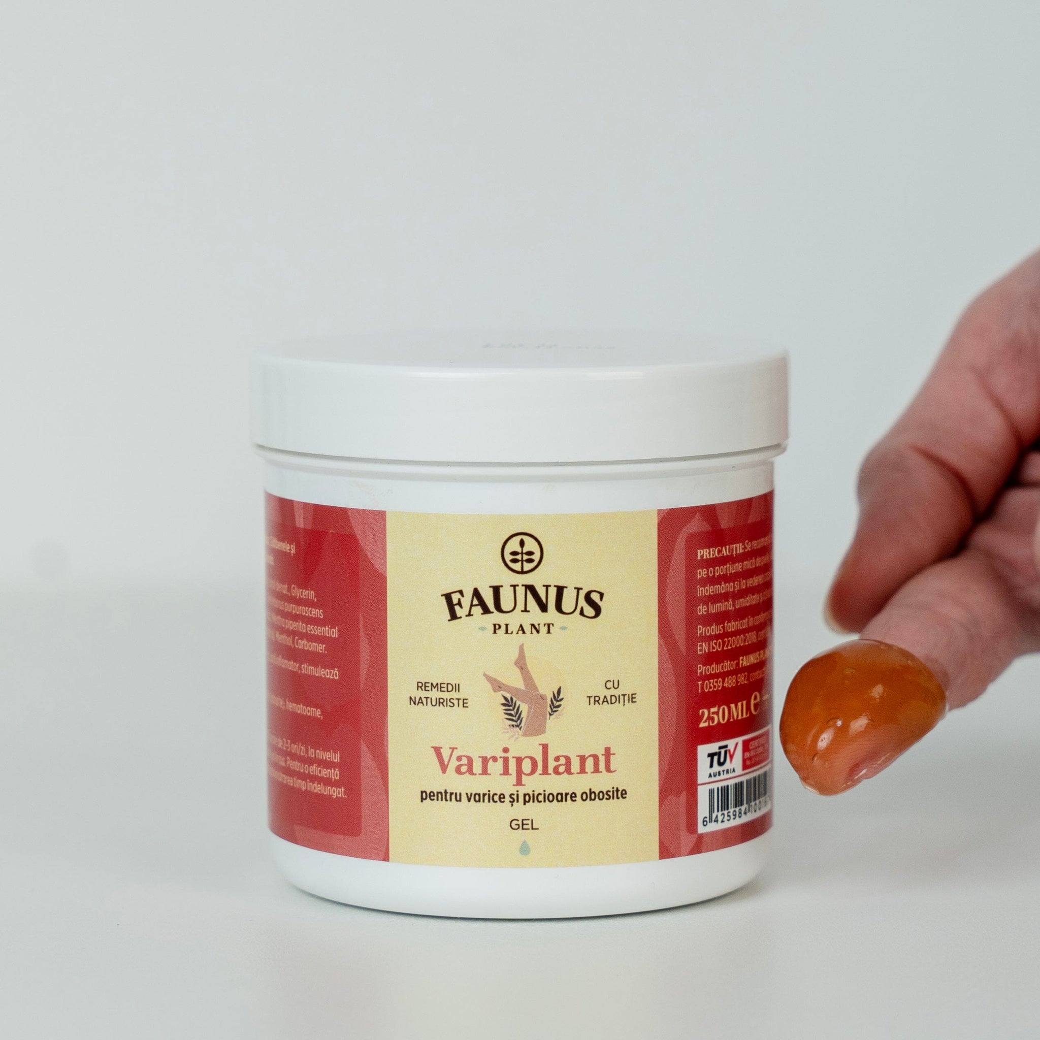 Textura Gelului Variplant de la Faunus Plant, cu o imagine care prezintă consistența produsului într-o nuanță de portocaliu, destinat îngrijirii picioarelor obosite și pentru varice.
